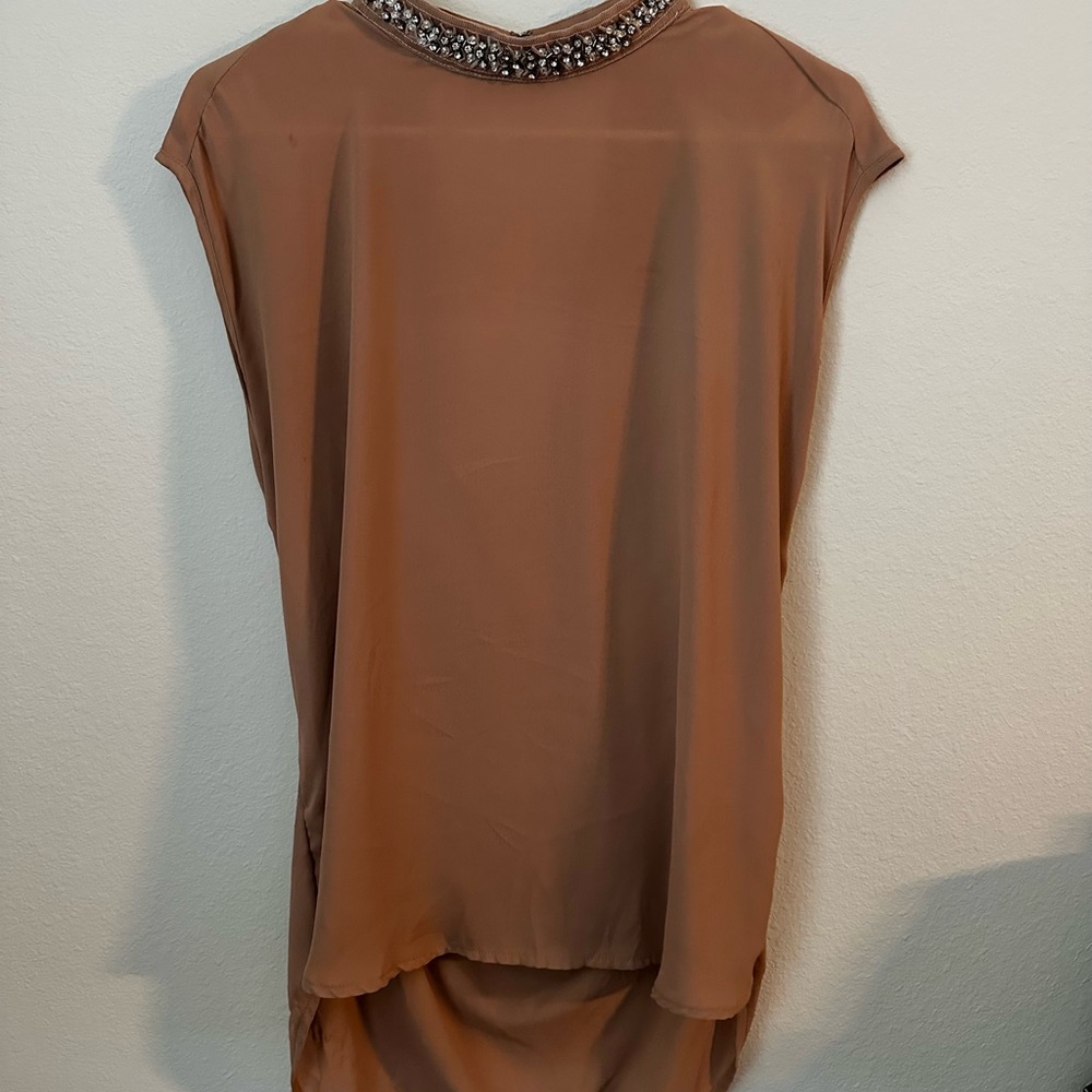 Elegant Brown Sleeveless Top with Embellished Neckline